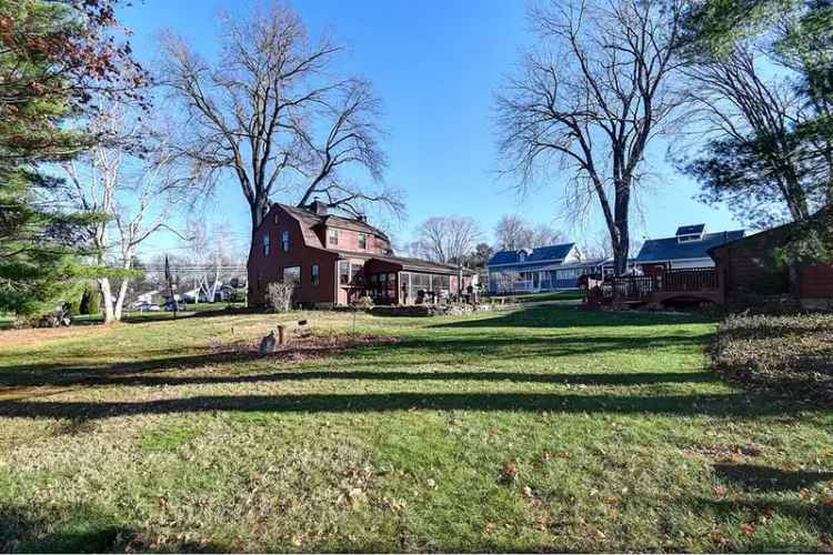 Historic Homestead Buy in East Hartford with Garden Views and Modern Upgrades