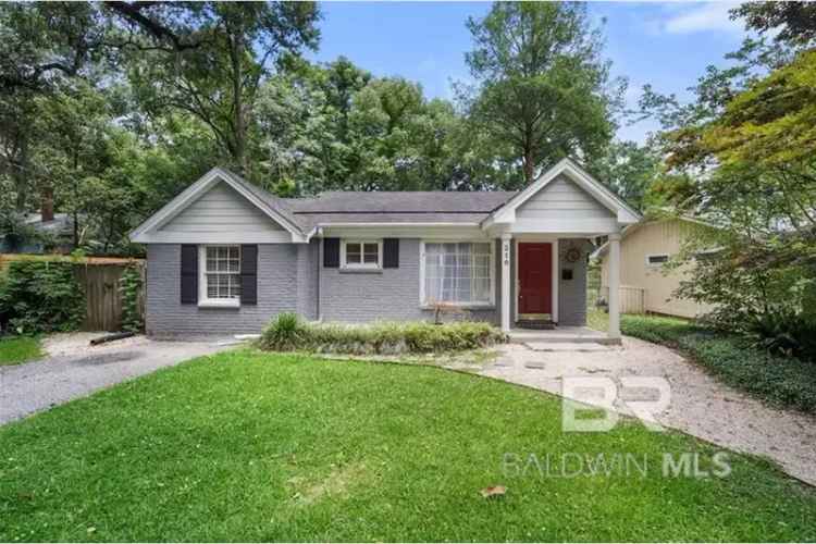 Cottage for sale in Midtown Mobile with fenced backyard and hardwood floors