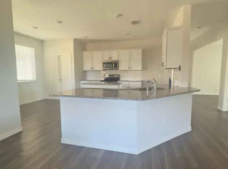 Rent Modern Home with Open Layout in Fate TX