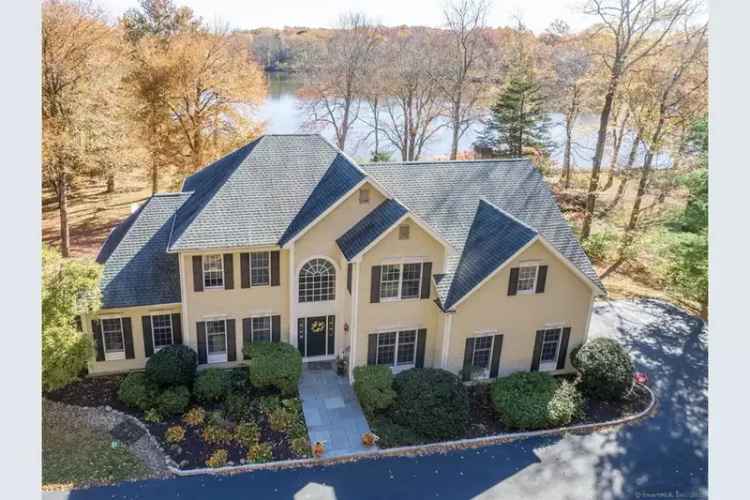 Buy customized colonial home in Wilton with breathtaking pond views