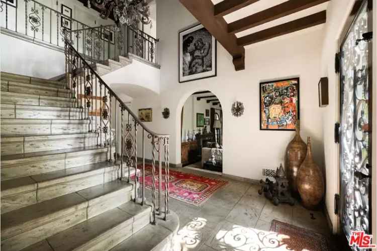 Buy Spanish House with Lush Greenery and Timeless Architecture