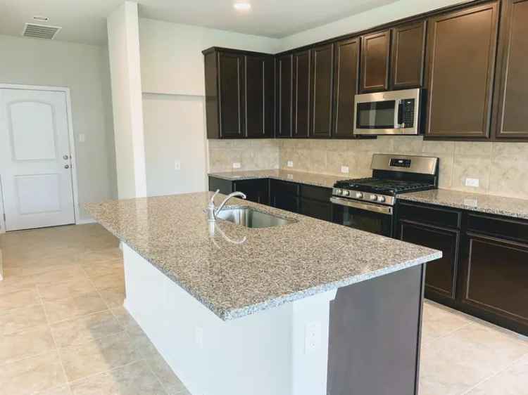 Rent New Home in Pflugerville with 4 Bedrooms and Backyard Features