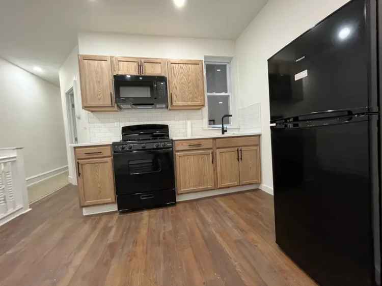 Rent Apartment Unit Newly Renovated 3 Bed or 2 Bed with Living Room