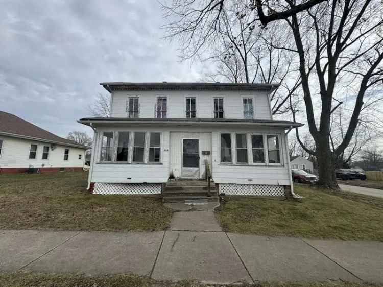 Renovate this large home with 5 bedrooms and potential for a 2 unit dwelling