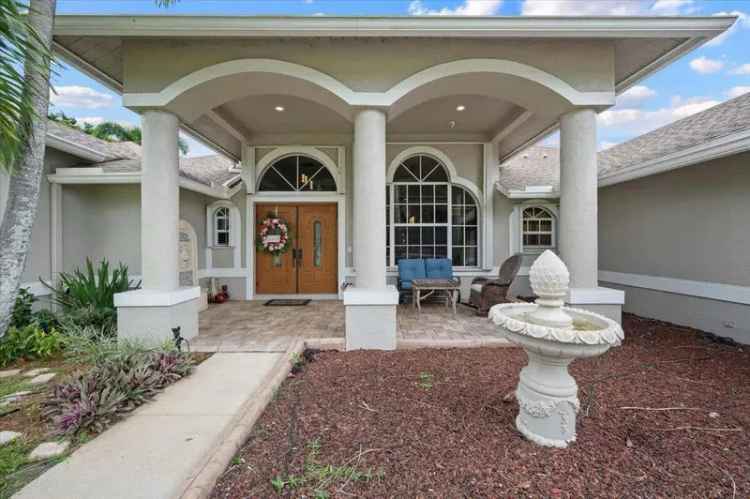 Buy Pool Home in The Acreage with Spacious Floor Plan and Luxurious Features