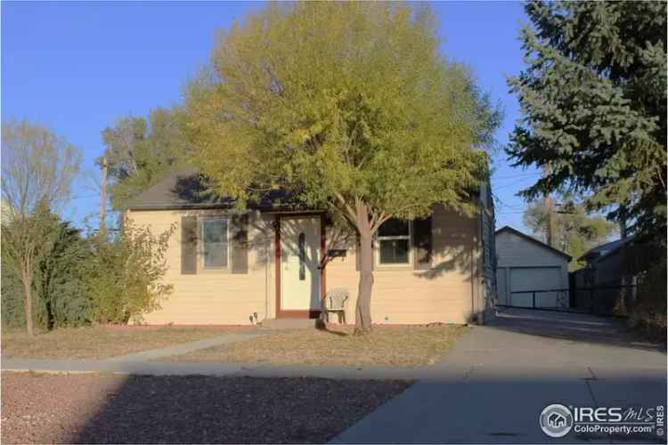 Buy cozy ranch home with large lot and garage