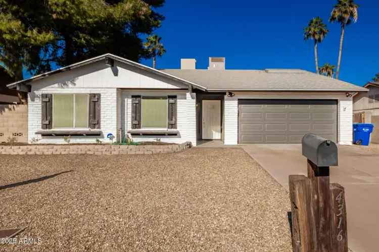 buy house in prime Phoenix location with pool and updated features