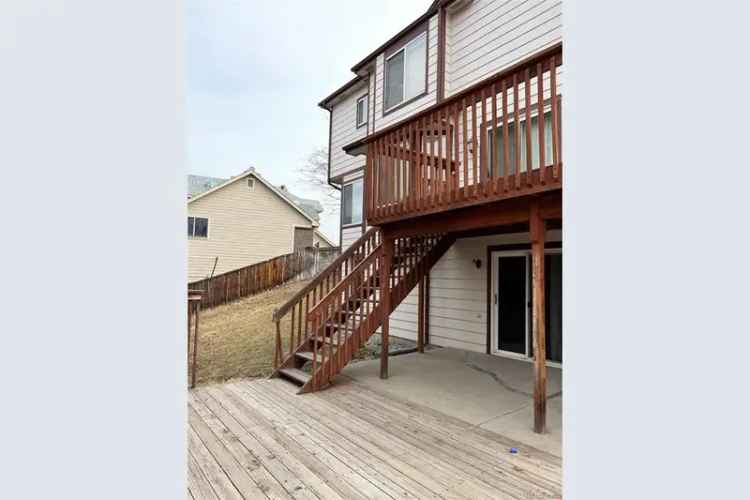 Buy house near cul-de-sac with double-tiered deck and spacious backyard