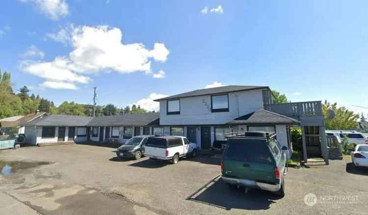 Invest in 9 Unit Apartment Building with Renovated Units and Income Potential