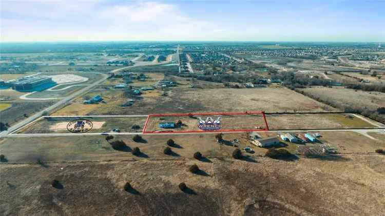 Invest in a prime commercial lot in Anna for development opportunities