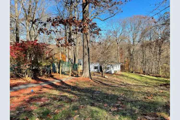 Buy Cozy Cottage in Monroe with Natural Beauty and Room to Expand