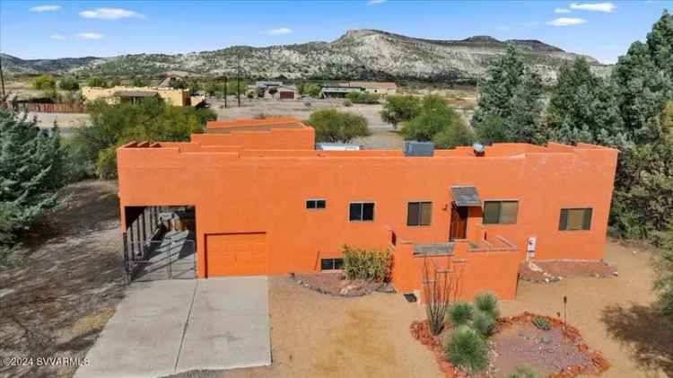 Buy Sante Fe Style Home with Acreage in Peaceful Location