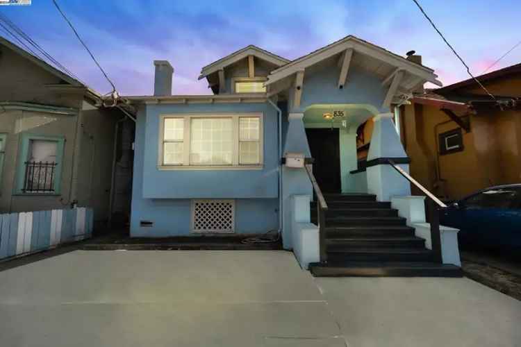 Craftsman home buy with detached ADU featuring original moldings and charm