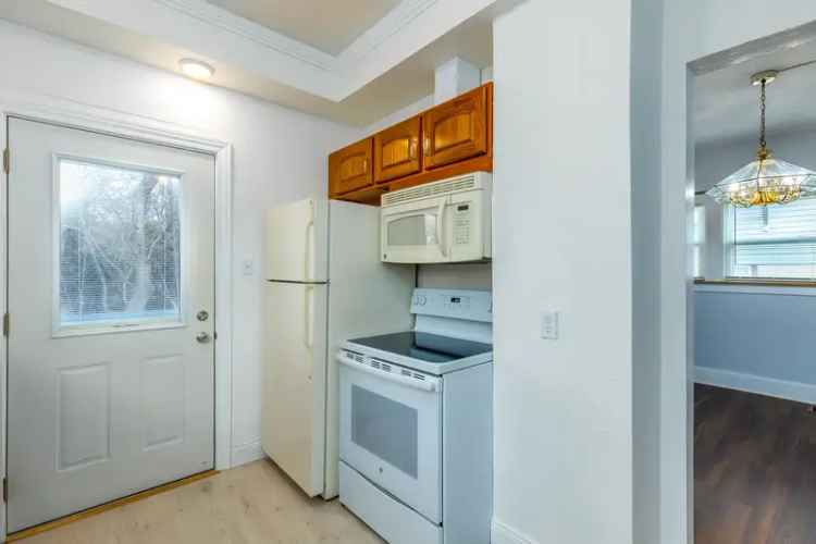 Rent Home with Remodeled Kitchen in Sunlit Location