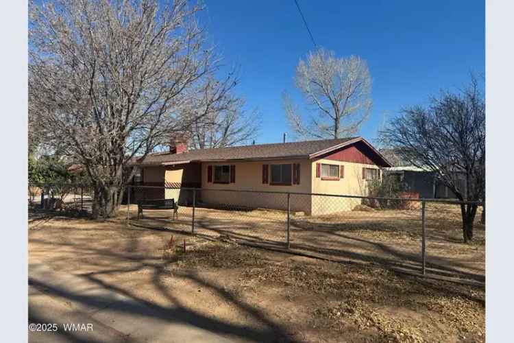 Buy Home in Downtown Snowflake with Character and High Potential