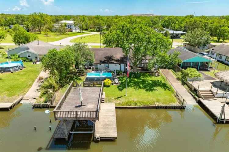 Buy Waterfront Home in Bayou with 3 Bedrooms and Dock Features