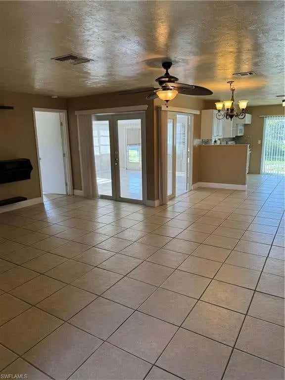 Rent 2 Bedroom 2 Bath Single Family Home with Garage in Lehigh Acres