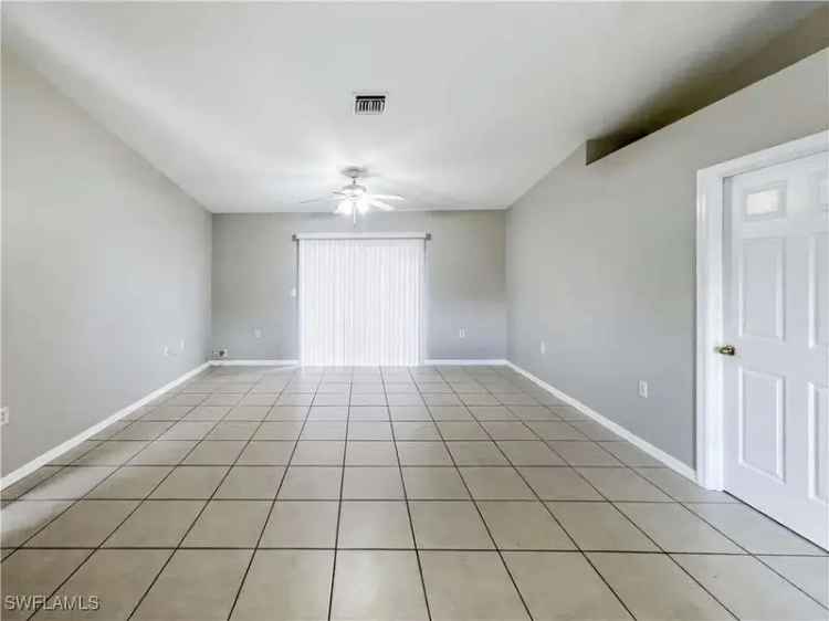 Rent Single Family Home in Lehigh Acres with Modern Kitchen and Backyard