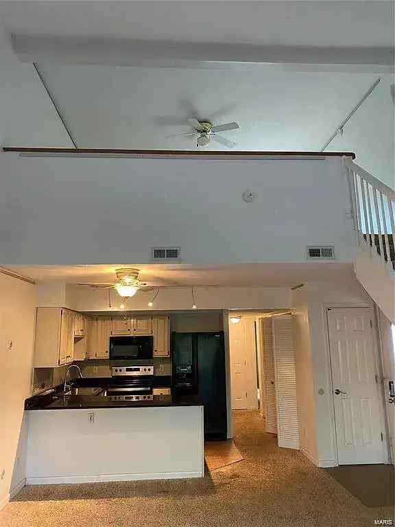 Rent Loft Style Townhome in Ballwin with Pool and Spacious Design