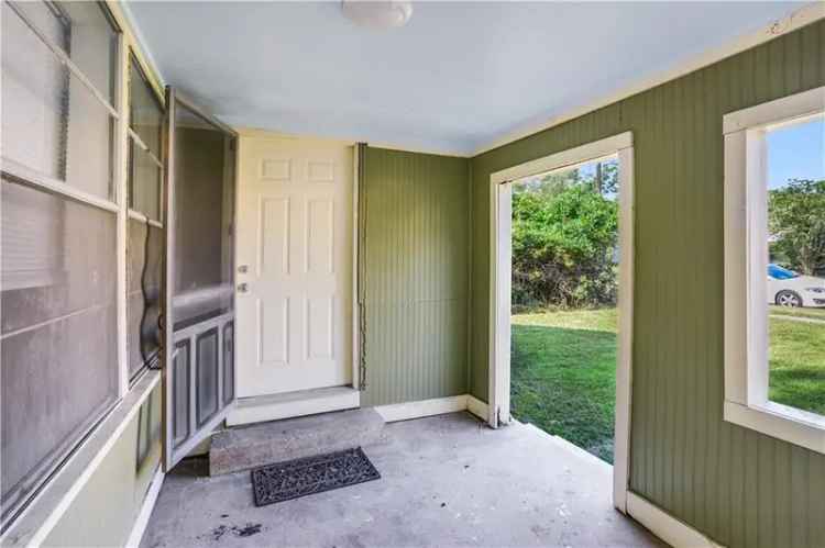 Buy Cottage in Midtown with Porch and Updated Kitchen