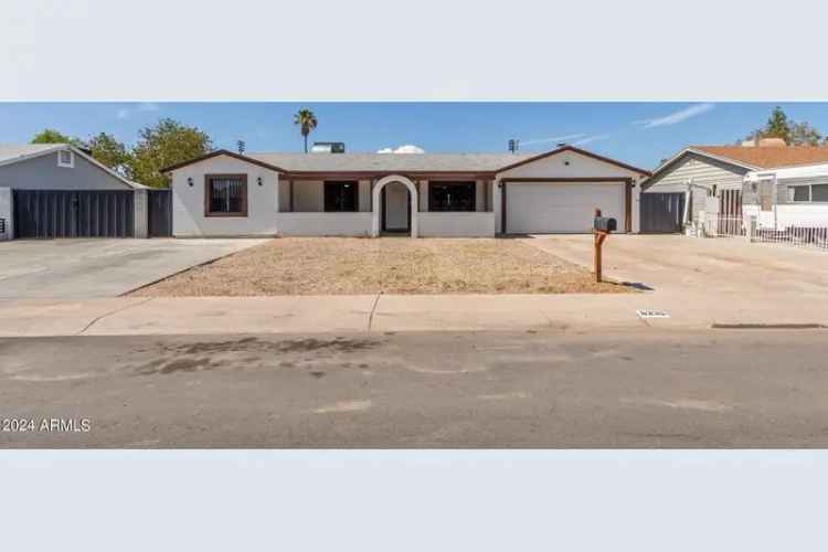 Buy charming home with 4 beds, 2 baths and spacious backyard close to parks