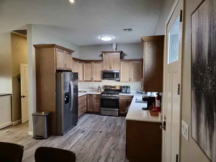 Rent New Construction Home with Fenced Yard and High-End Furnishings