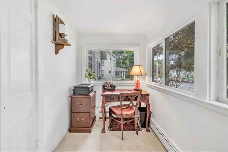 Buy Vintage Cottage in Westport with Spacious Yard and Unique Features