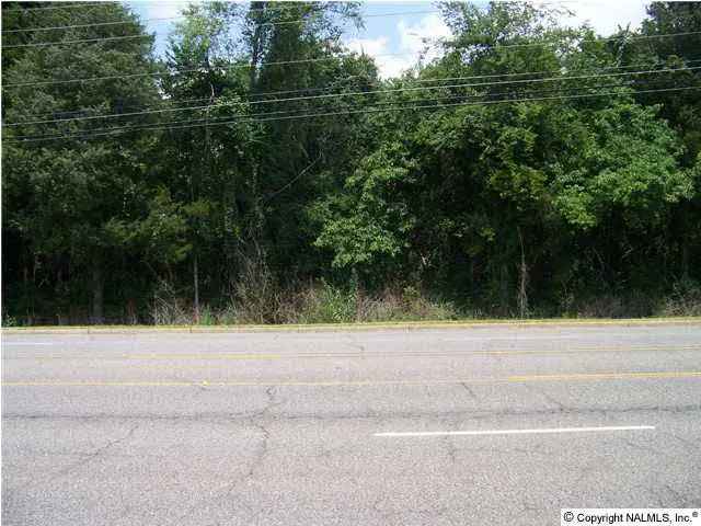 Wooded land for sale with potential uses