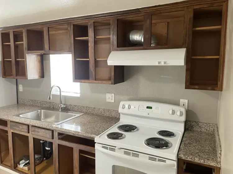 Rent Apartment Unit with Private Yard in a Lower Level Duplex