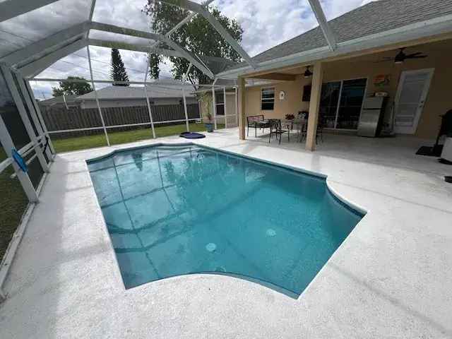 Rent 4 bedroom home in quiet neighborhood with pool in Tradition