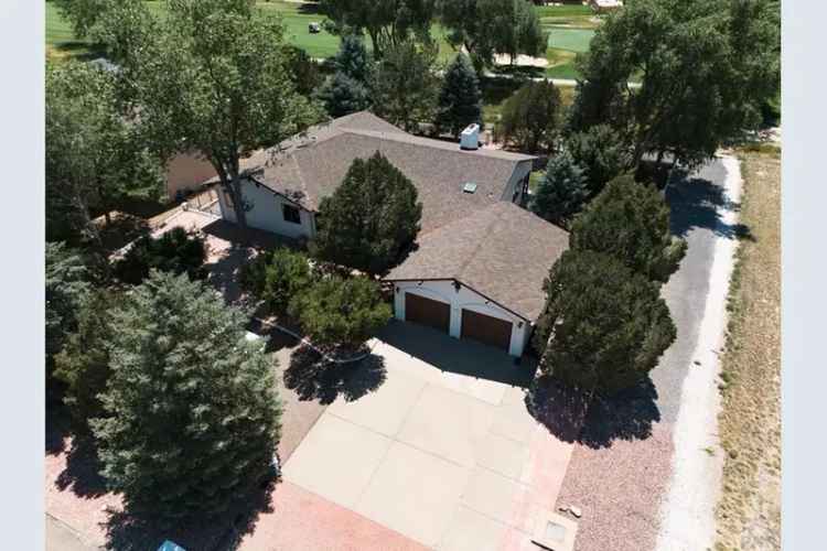 Buy Home with Golf Course Views in Pueblo West with Modern Upgrades