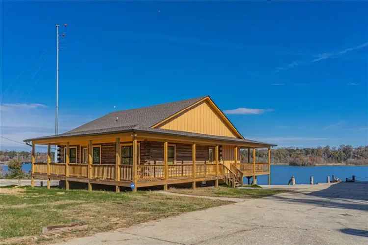 Buy Lakefront Home with Wraparound Porch and Spacious Features