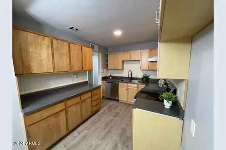 Updated home for rent featuring 3 bedrooms, 2 baths, and garage