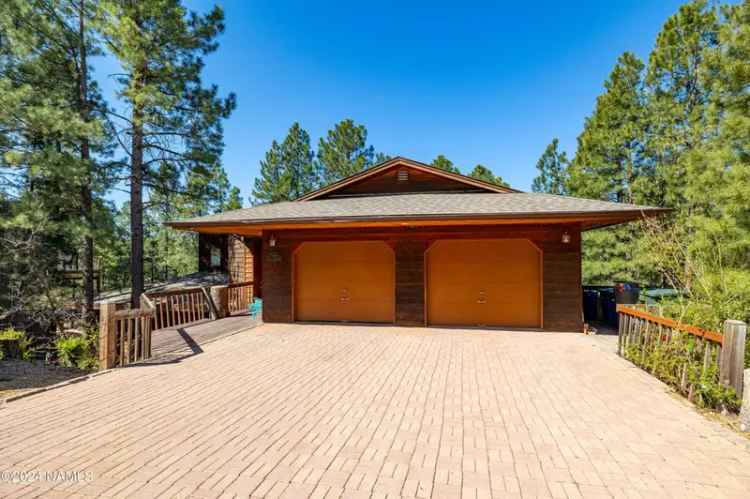 Buy Custom Cedar-Sided Home in Switzer Mesa with Stunning Views