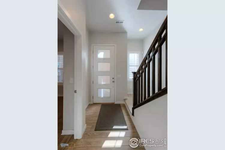 Buy Townhome in Downtown Superior with Custom Shutters and Balcony