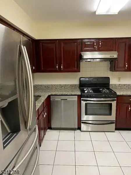 Rent Townhouse Spectacular Updated Kitchen and Baths Hardwood Floors