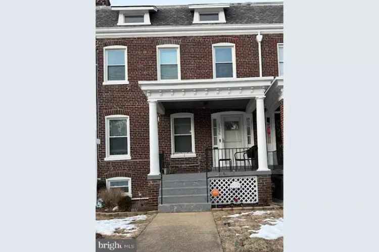 Invest in Renovation Opportunity Spacious End Unit Row House in Brookland