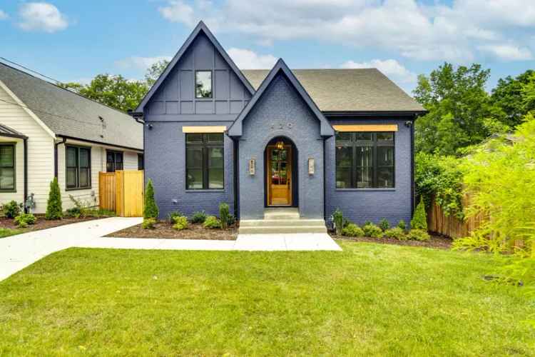 Buy Tudor Home in Madison with Fenced Yard and 12 Foot Ceilings