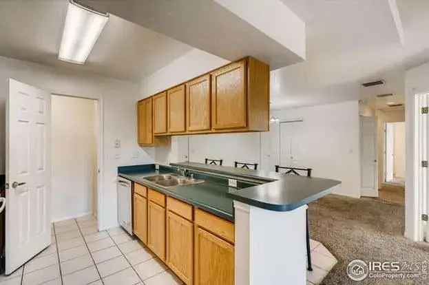 Condo for Rent in Top Floor Location with Private Balcony and Garage