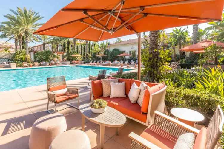 Rent Tuscan Inspired Apartments in Gated Community with Poolside Cabanas