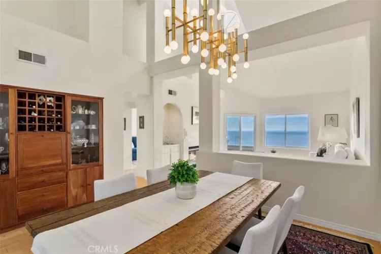 Buy Mediterranean home with ocean views in Laguna Sur gated community