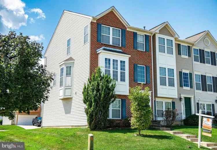 Buy Brick-Front End-Unit Townhome in Holly Woods Community with 3 Bedrooms and 2-Car Garage