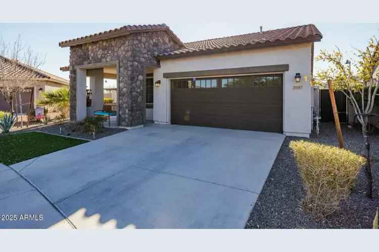 Buy House in Victory at Verrado with Mountain Views and Gourmet Kitchen