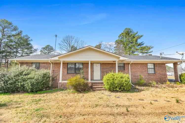 Buy Brick Home in Hartselle with Spacious Lot and Workshop Features