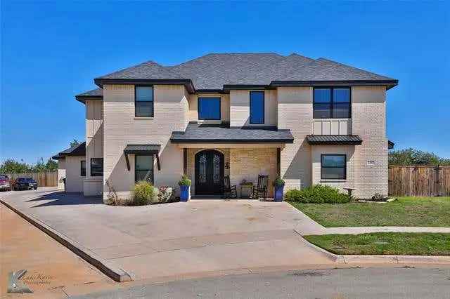 Custom home for sale in Elm Creek with 5 bedrooms and a stunning patio