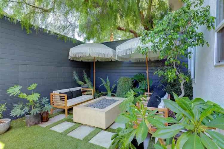 Invest or Live in a Modern Triplex with Private Backyards in Mid City