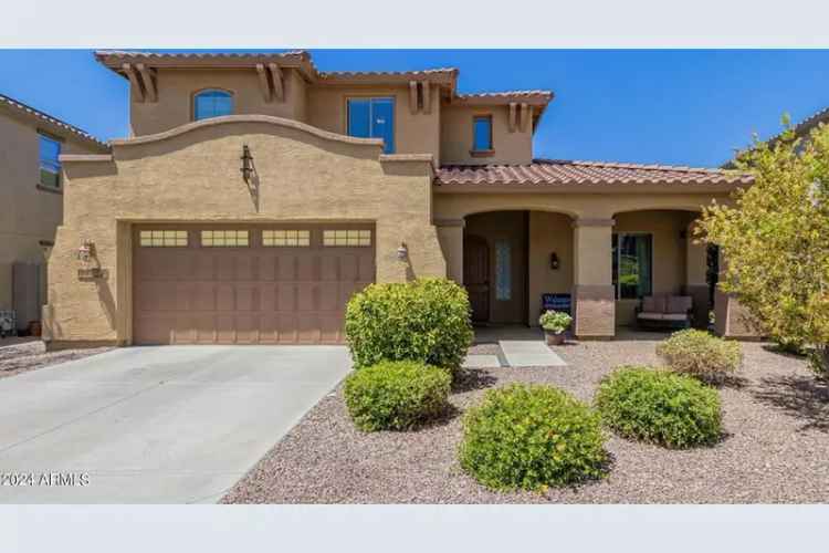 Buy Home in Estrella Community with Upgrades and Backyard Oasis