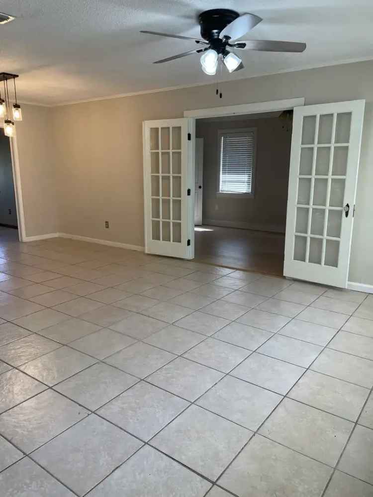 Rent Charming 4 Bedroom Home in Mid City Baton Rouge with Backyard