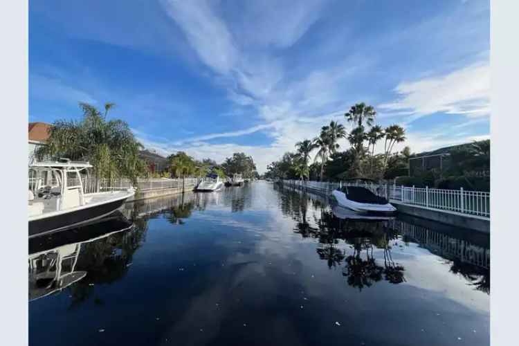 Renovated home for sale with boat access in Inlets community