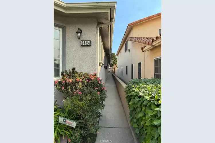 Cash Sale Duplex in Long Beach with Large Lot and Updated Features